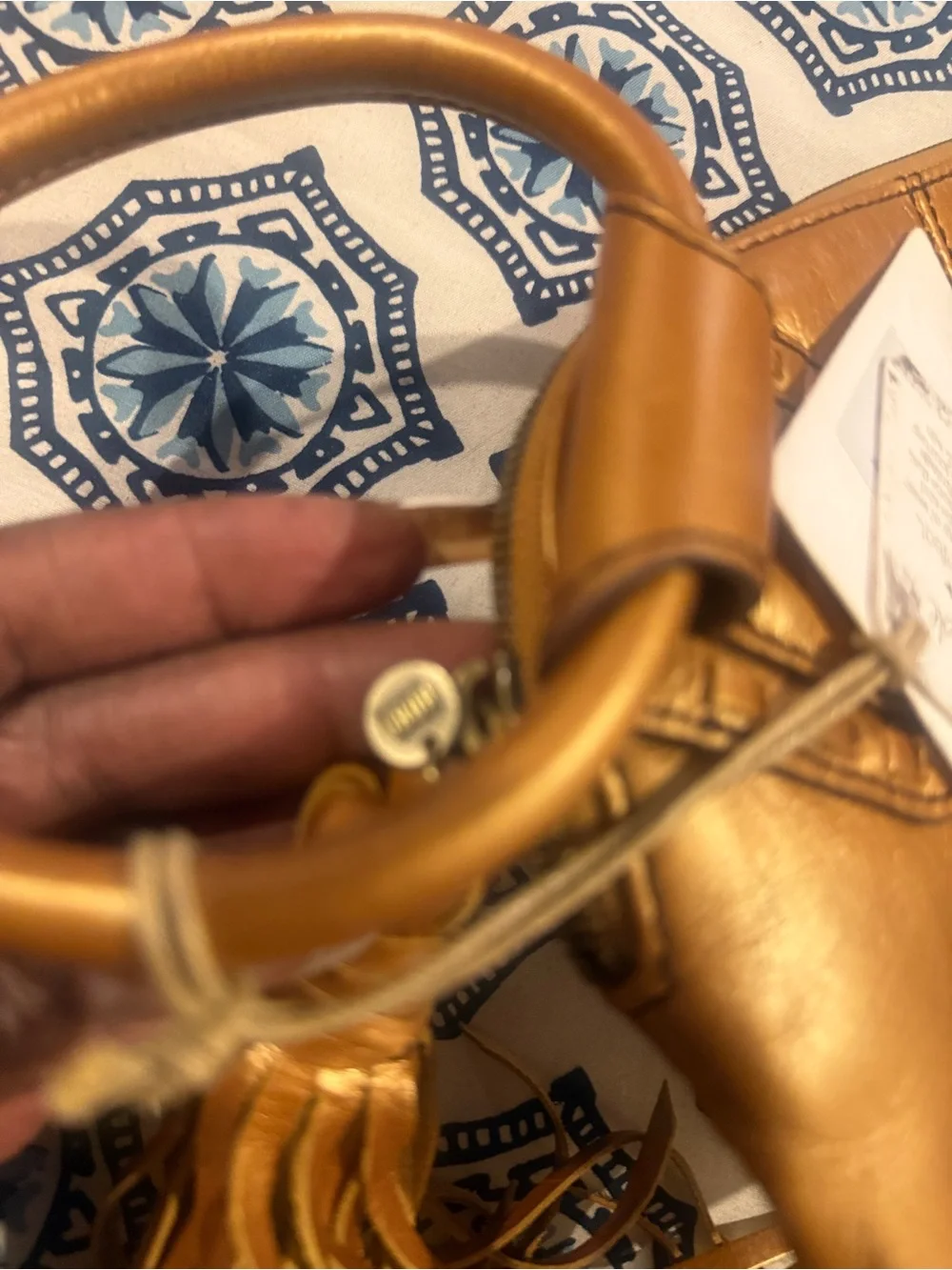 HOBO Metallic Gold Leather Wristlet with Tassel and Ring Handle